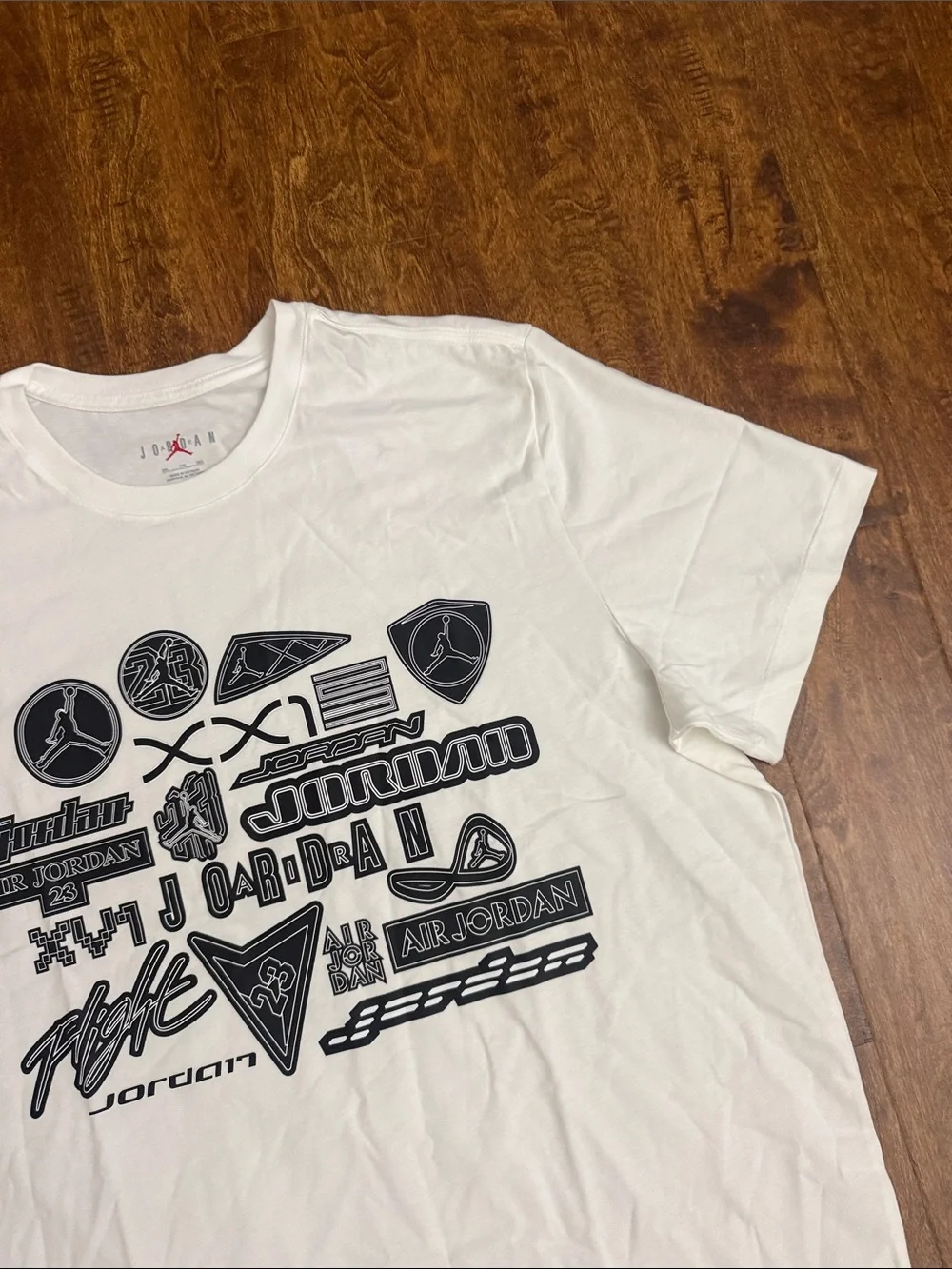 Jordan White Short-Sleeve Tee with Navy Logo Collage